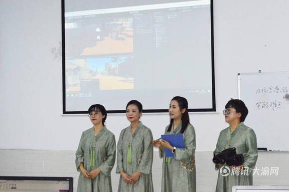 说明:C:\Users\dlw\AppData\Local\Microsoft\Windows\INetCache\Content.Word\《和而不同,美美与共——楼兰古城场景复原实践》教学团队决赛现场.jpg